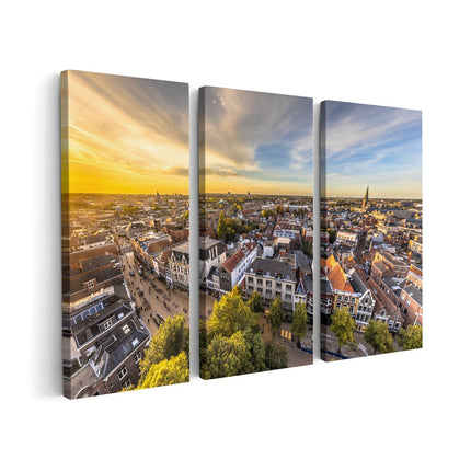 Canvas schilderij drieluik Groningen Skyline Stad bij Zonsondergang