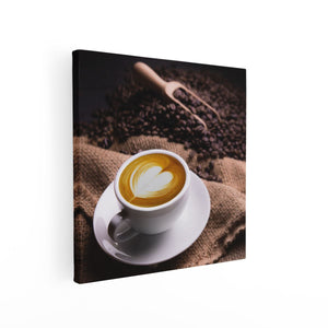 Canvas schilderij vierkant Kopje Koffie In Een Hartje Met Koffiebonen