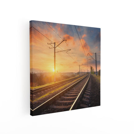 Canvas schilderij vierkant Rails Spoorweg Bij Zonsondergang