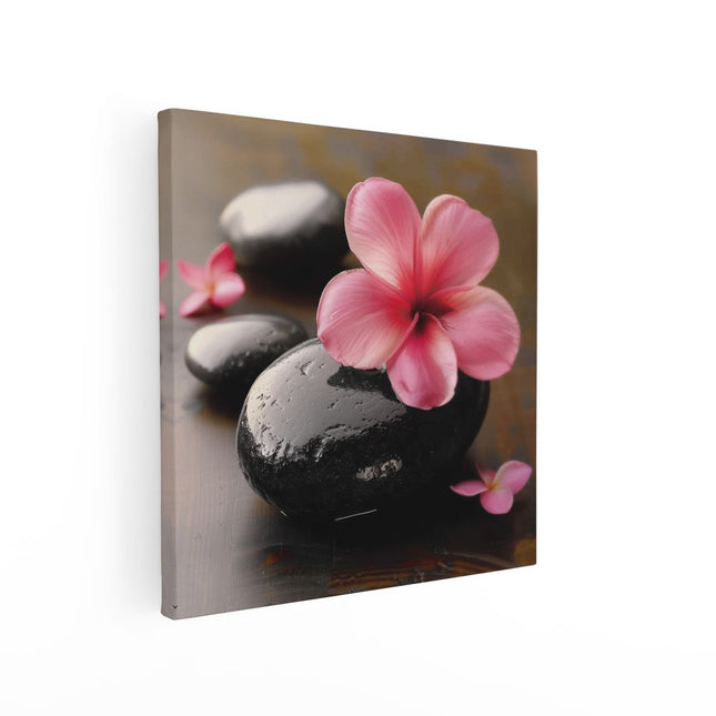 Canvas schilderij vierkant Zwarte Stenen met een Roze Bloem