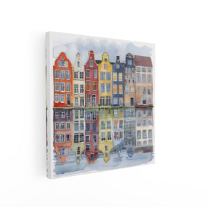 Canvas schilderij vierkant Kleurrijke Huizen Weerspiegeld in een Watermassa