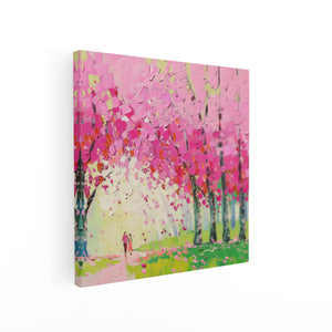 Canvas schilderij vierkant Kunstwerk van een Stel dat door Roze Bloeiende Bomen loopt