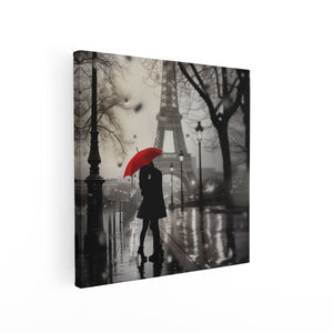 Canvas schilderij vierkant Paar dat een Paraplu in de Regen Houdt Dichtbij de Eiffeltoren