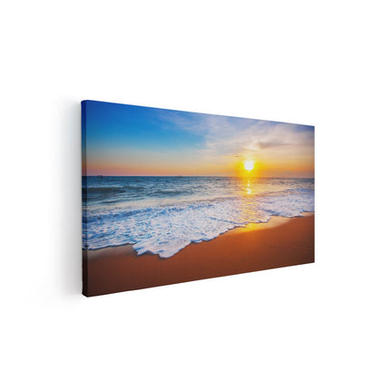 Canvas schilderij vooraanzicht Strand En Zee Tijdens Zonsondergang