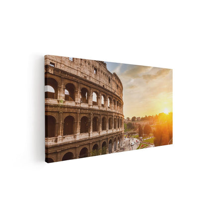 Canvas schilderij vooraanzicht Colosseum bij Zonsondergang in Italïe