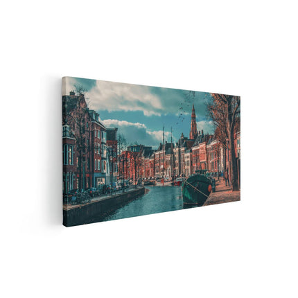 Canvas schilderij vooraanzicht Gracht in Groningen 