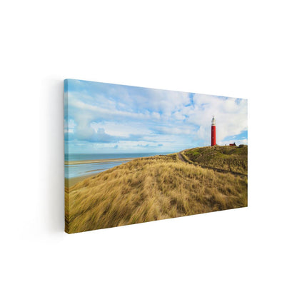 Canvas schilderij vooraanzicht Vuurtoren met Duinen in Texel