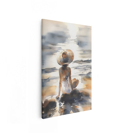 Canvas schilderij vooraanzicht Vrouw Zittend op het Strand met een Strohoed