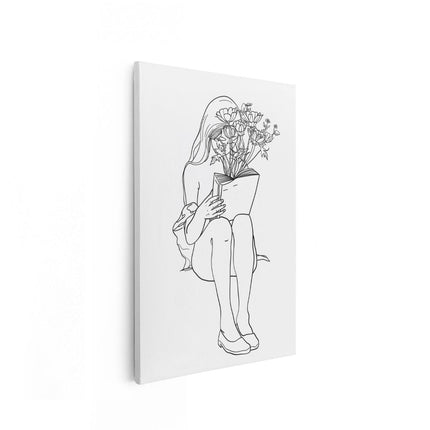 Canvas schilderij vooraanzicht Meisje dat een Boek met Bloemen Leest