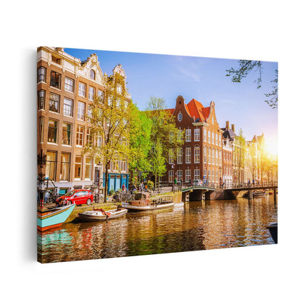 Canvas schilderij vooraanzicht Amsterdamse Gracht Tijdens Zonsondergang