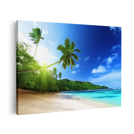 Canvas schilderij vooraanzicht Strand Tijdens Zonsondergang In Seychellen