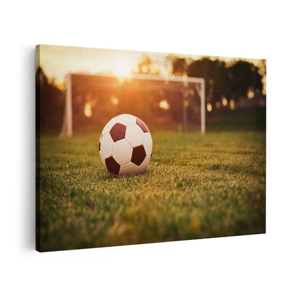 Canvas schilderij vooraanzicht Voetbal Met Goal Tijdens Zonsondergang