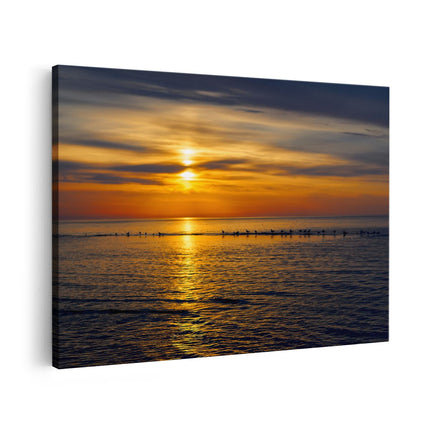 Canvas schilderij vooraanzicht Zonsondergang In De Zee