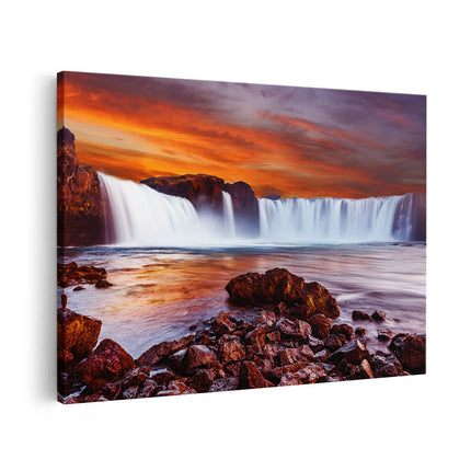 Canvas schilderij vooraanzicht Waterval Bij Een Oranje Hemel