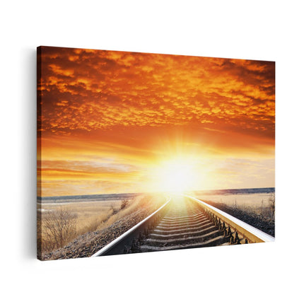 Canvas schilderij vooraanzicht Rails Spoorweg Bij Zonsondergang