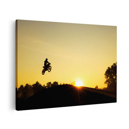 Canvas schilderij vooraanzicht Silhouet Van Een Motorcross Bij Zonsondergang
