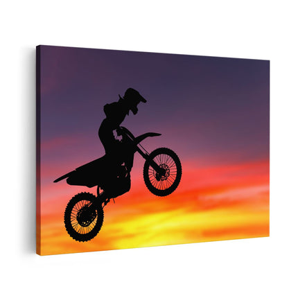 Canvas schilderij vooraanzicht Silhouet Van Een Motorcross In De Lucht 