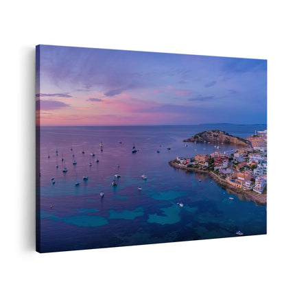 Canvas schilderij vooraanzicht Ibiza met Boten op het Water bij Zonsopgang