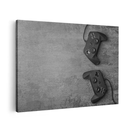 Canvas schilderij vooraanzicht Twee Game Controllers op Tafel - Gaming