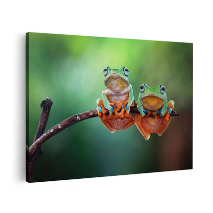 Canvas schilderij vooraanzicht Twee Boomkikkers op een Tak