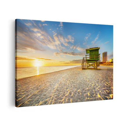 Canvas schilderij vooraanzicht Strandhuisje bij Zonsondergang