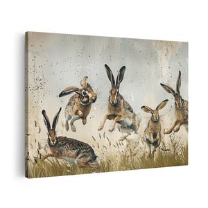 Canvas schilderij vooraanzicht Hazen Springen in het Gras