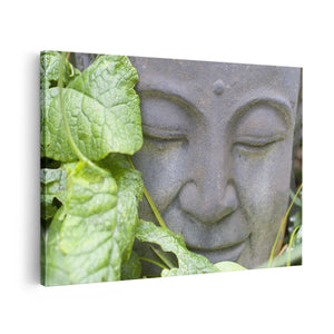 Canvas schilderij vooraanzicht Buddha Hoofd met Blad