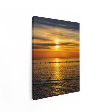 Canvas Schilderij Staand Zonsondergang In De Zee