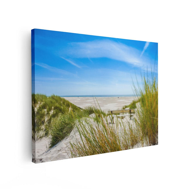 Canvas Schilderij Vooraanzicht Bankje aan het Strand
