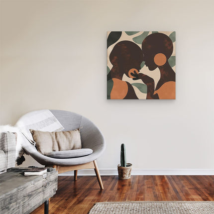 Canvas schilderij kamer Twee Silhouetten van Vrouwen die Elkaar Kussen