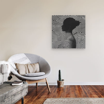 Canvas schilderij kamer Silhouet van een Vrouw voor een Zebrapatroon