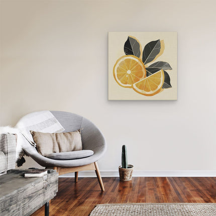 Canvas schilderij kamer Twee Stukjes Sinaasappel met Bladeren op een Beige Achtergrond