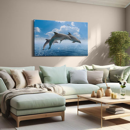 Canvas schilderij woonkamer Dolfijnen Springen uit de Blauwe Zee