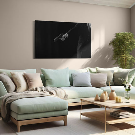 Canvas schilderij woonkamer Man met een Pistool in zijn Handen