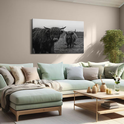 Canvas schilderij woonkamer Twee Schotse Hooglanders in de Weide - Zwart Wit