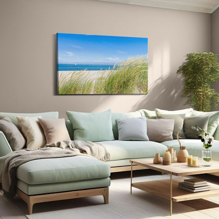 Canvas schilderij woonkamer Strand en Zee met een Zeilboot