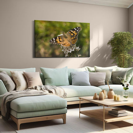 Canvas schilderij woonkamer Vlinder op Bloem