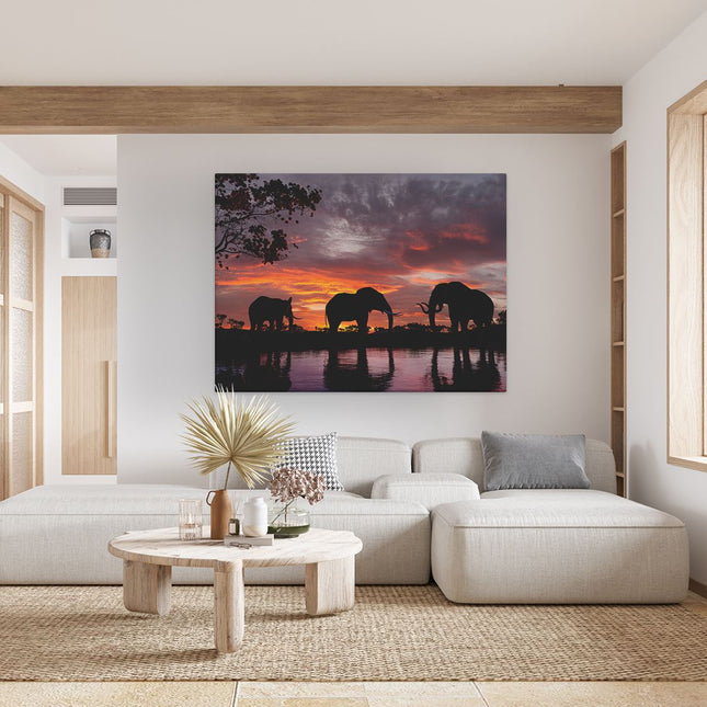 Canvas Schilderij Woonkamer Olifanten Tijdens Zonsondergang - Silhouet