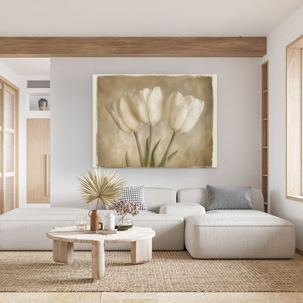 Canvas Schilderij Woonkamer Drie Witte Tulpen op een Beige Achtergrond