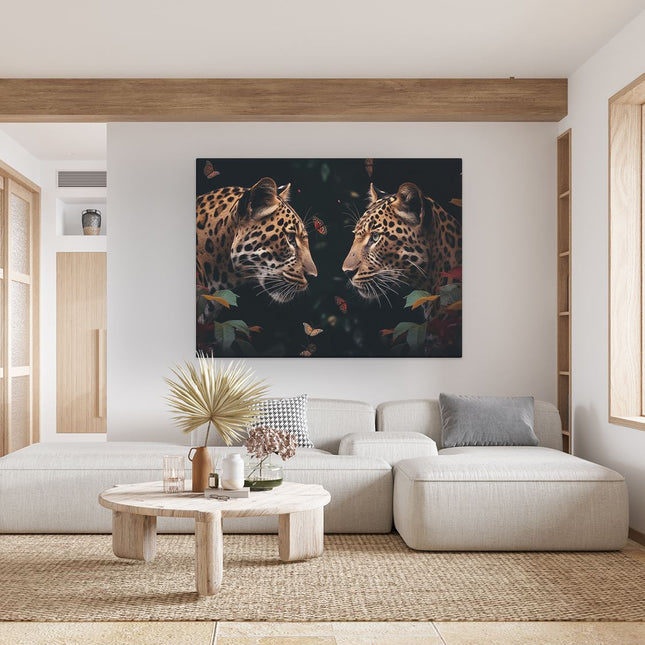 Canvas Schilderij Woonkamer Twee Luipaarden die Elkaar Aankijken