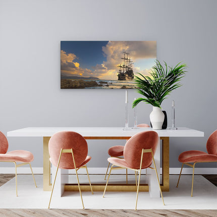 Canvas schilderij woonkamer Piratenschip aan de Kust bij Zonsondergang