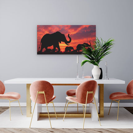 Canvas schilderij woonkamer Silhouetten van Olifanten bij Zonsondergang