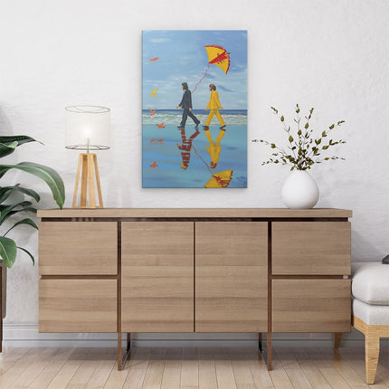 Canvas schilderij interieur Twee Mensen die met een Vlieger over het Strand Lopen