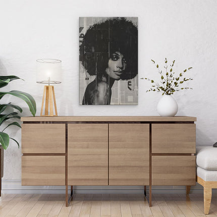 Canvas schilderij interieur Vrouw met een Afro op een Krant