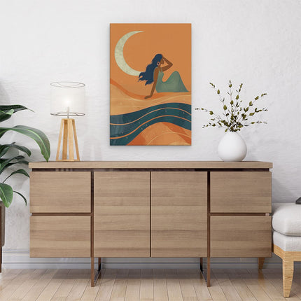 Canvas schilderij interieur Vrouw zit op het Zand met een Halve Maan op de Achtergrond