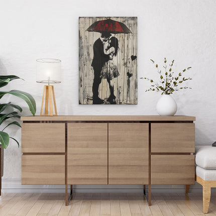 Canvas schilderij interieur Paar Kussen onder een Paraplu