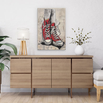 Canvas schilderij interieur Paar Rode Converse Schoenen op een Krant