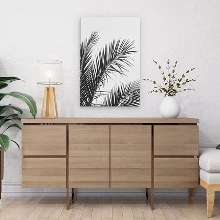 Canvas schilderij interieur Zwart Wit Beeld van Palmbladeren tegen een Witte Achtergrond