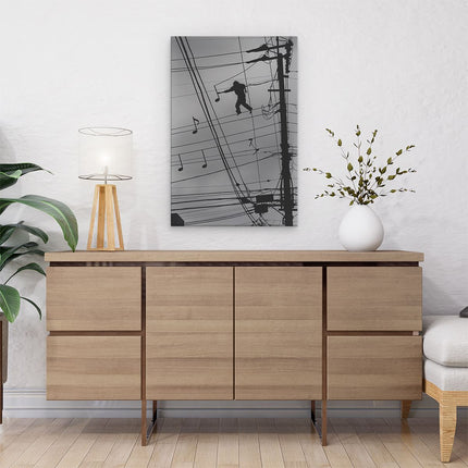 Canvas schilderij interieur Silhouet van een Man op een Hoogspanningslijn met Muzieknoten
