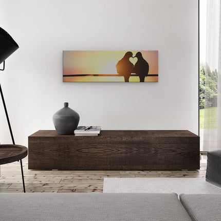 Canvas Schilderij Woonkamer Schilderij Groep Paarden die op een Strand Rennen onder een Bewolkte Hemel